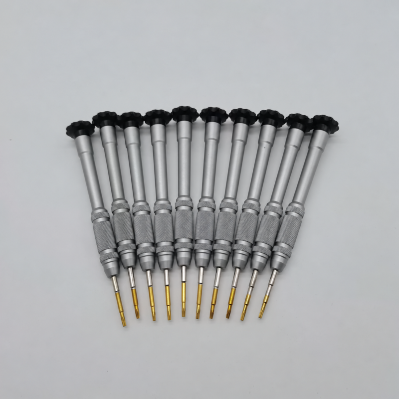 Ten IKSONIC T6 precision screwdrivers arranged in a fan, with knurled silver-colored handles and black swivel caps.