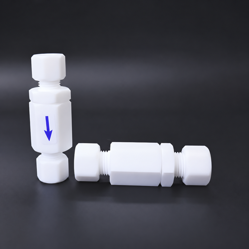 iksonic-ptfe-check-valve-supplier-assembled-pair Two white PTFE check valves with compression nuts, one upright with a blue flow-direction arrow and one horizontal; supplied by IKSONIC in China.
