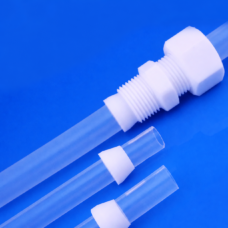 PTFE ferrules on translucent tubes with a threaded fitting in an application example from IKSONIC, not a representation of a complete supplied assembly.