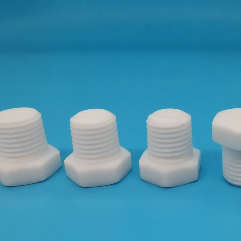 White PTFE hex-head threaded pipe plugs in several sizes on a blue background, with the outer plugs partially cropped; supplied by IKSONIC in China.