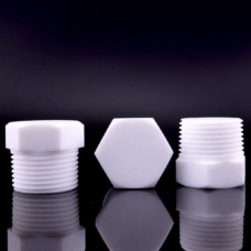 White PTFE plugs showing a hexagonal end face and external threads, IKSONIC
