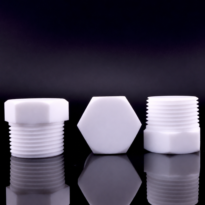 White PTFE plugs showing a hexagonal end face and external threads, IKSONIC
