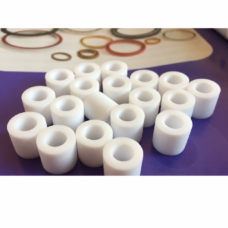White PTFE cylindrical insulating sleeves with plain bores, supplied by IKSONIC in China