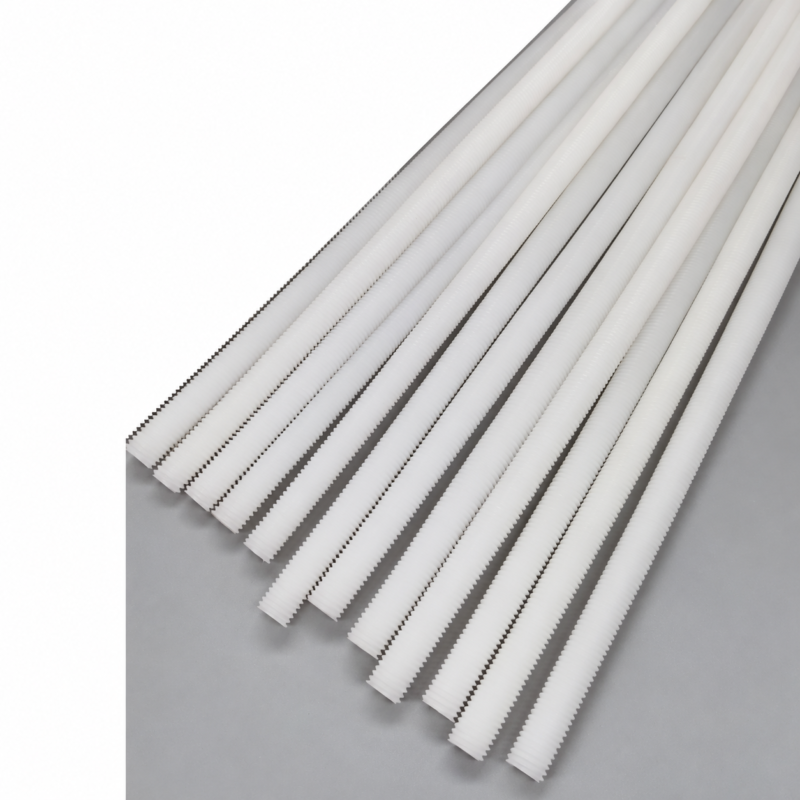 White PTFE threaded rods arranged diagonally on a gray surface, supplied by IKSONIC in China