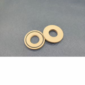 Two IKSONIC tan rotary evaporator seal gaskets, with a black circular groove on the left gasket and a plain face on the right.