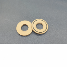 Two IKSONIC tan rotary evaporator seal gaskets, with a plain face on the left gasket and a black circular groove on the right.