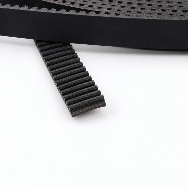 Tooth and edge detail of an IKSONIC rubber elevator door timing belt.