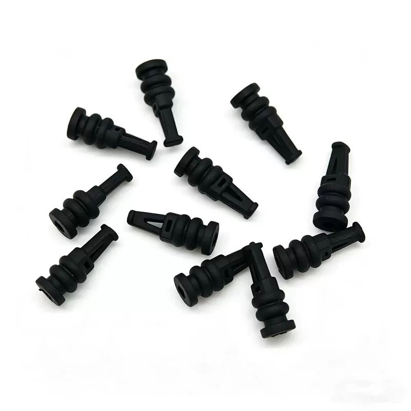 Close view of black silicone dampers showing retaining tips, grooves and end openings, supplied by IKSONIC.
