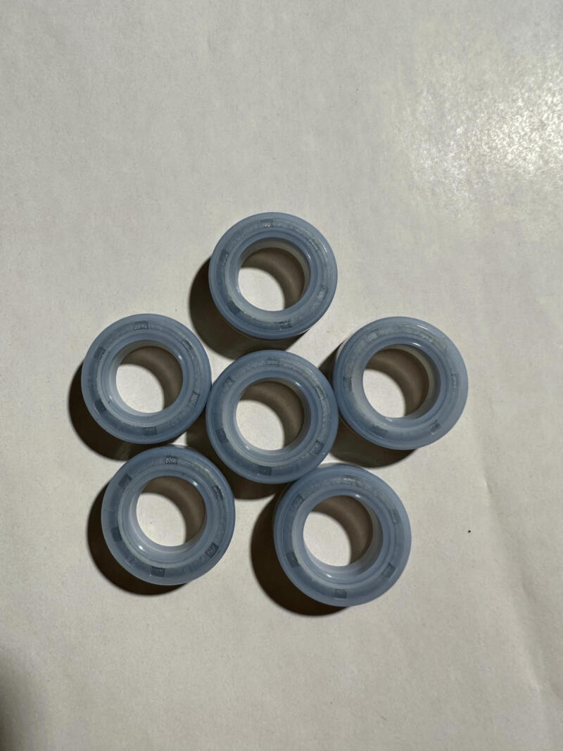 Front view of six IKSONIC silicone oil seals.