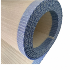 Rolled beige and blue-grey IKSONIC spiral mesh belt showing its edge loops and layered construction.