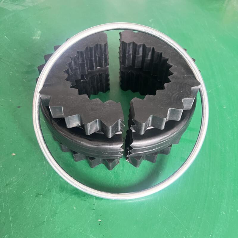 iksonic-split-toothed-coupling-ring-retaining-ring-detail Split toothed flexible coupling ring and metal retaining ring, supplied by IKSONIC