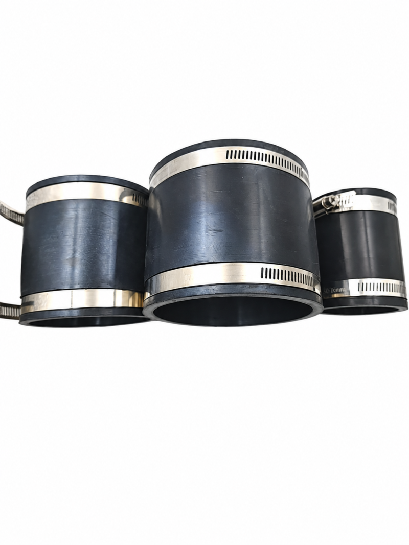 iksonic-straight-rubber-coupling-three-size-arrangement Three black straight rubber pipe couplings with metal band clamps, offered by IKSONIC China supplier.