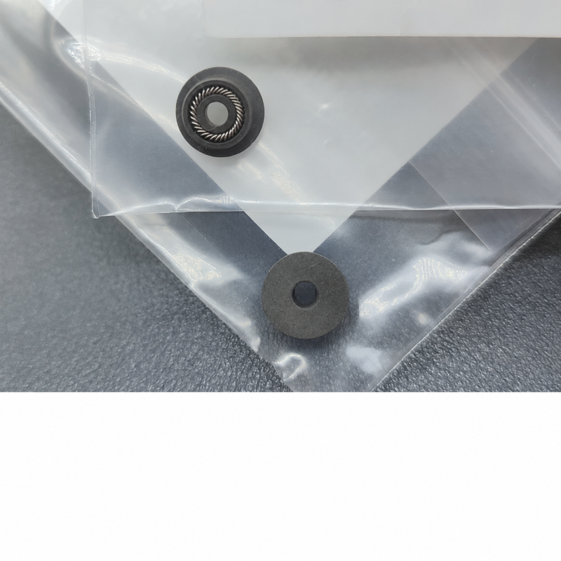 iksonic-supplier-228-35145-lc-plunger-rod-seals-front-and-back IKSONIC supplier photo of 228-35145 LC plunger rod seals, showing spring-facing and reverse faces in clear packaging
