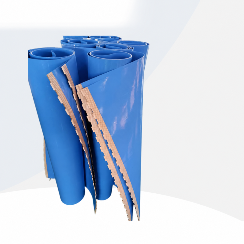 Blue conveyor belt rolls with exposed finger-joint edges in the IKSONIC supplier catalog.