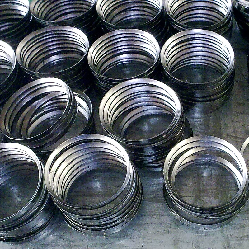Multiple stacks of beveled sealing rings shown in the source product photograph.