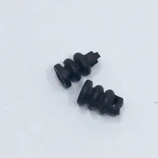 Close-up of two black gimbal dampers on a light background, listed by the supplier for DJI Mavic Air 2 repair.