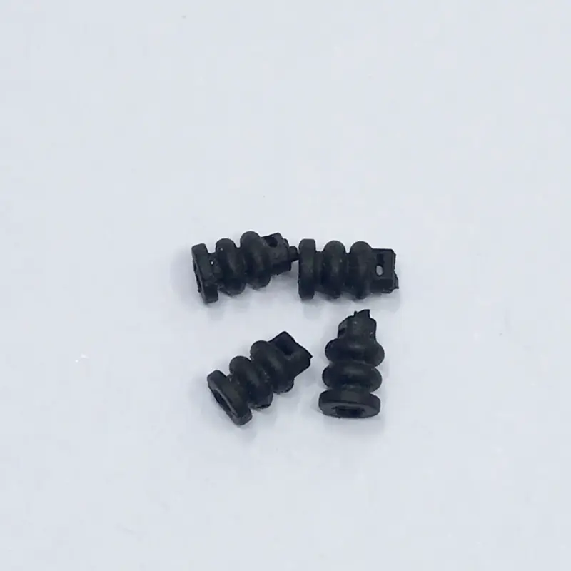Four black gimbal dampers on a light background, listed by the supplier for DJI Mavic Air 2 repair.
