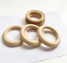 Annular PTFE piston seals showing broad faces and stepped outer profiles; supplied by IKSONIC in China