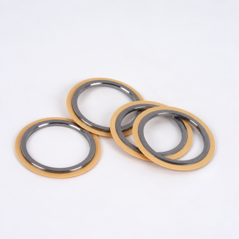 Four vacuum pump shaft seal rings with dark gray inner lips and gold-colored outer lips, arranged loosely with a separate lower-left ring and overlapping rings on the right; supplied by IKSONIC in China.