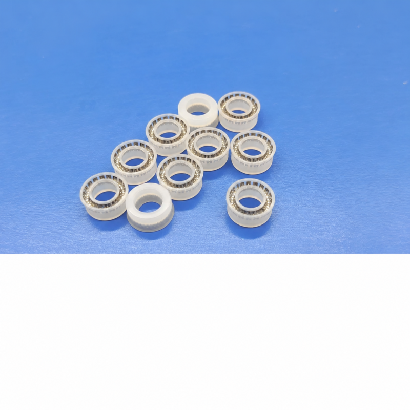 White UPE dispensing valve seal examples showing spring inserts and reverse faces, IKSONIC supplier