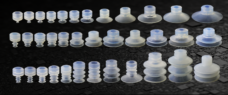IKSONIC vacuum suction cups in three rows of different sizes and profiles.