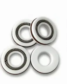 Four white spring-energized seals showing front and reverse faces, supplied by IKSONIC China.