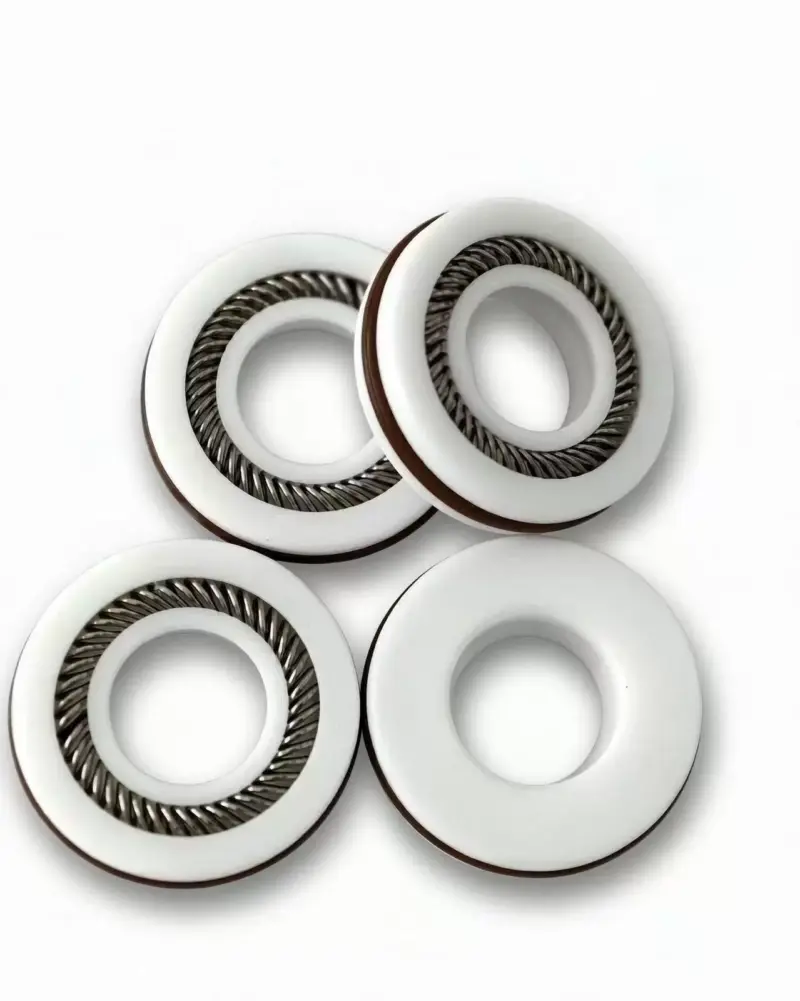 Four white spring-energized seals showing front and reverse faces, supplied by IKSONIC China.