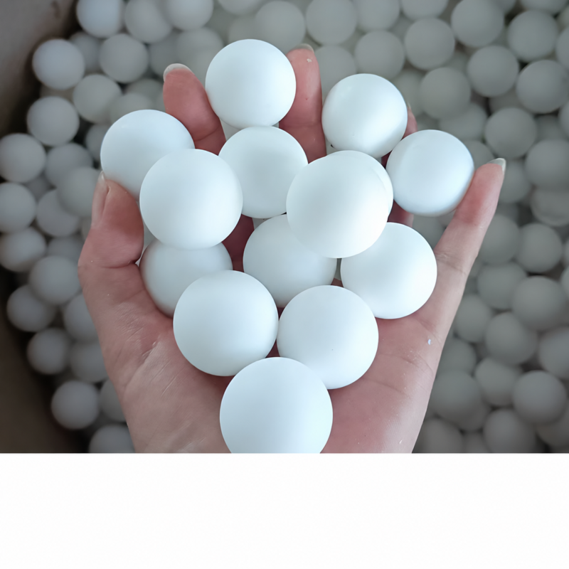 IKSONIC White PTFE Solid Balls - China Supplier White PTFE solid balls held in a hand, supplied by IKSONIC in China
