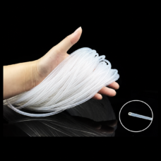 A hand holding a bundle of transparent silicone capillary tubing, with a circular close-up of an open tube end.