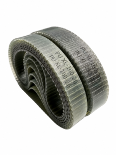 IKSONIC supplier photo of upright translucent XL polyurethane timing belt coils, showing layered inner teeth, steel-wire texture and original PU XL-160-20 markings.