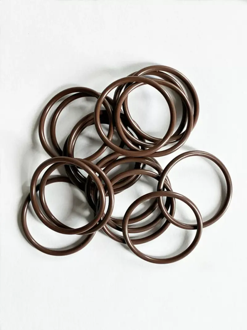 Japan-Imported P-Series FKM O-Rings Brown round-section O-rings arranged on a white surface.