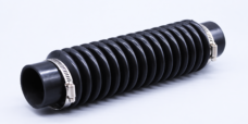 Long black corrugated bellows connector with an open end and a metal hose clamp at each end.