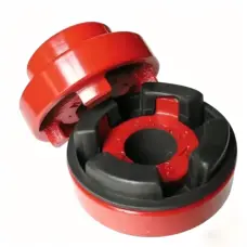 Red coupling halves shown separated, with a black lobed insert seated in the front half.