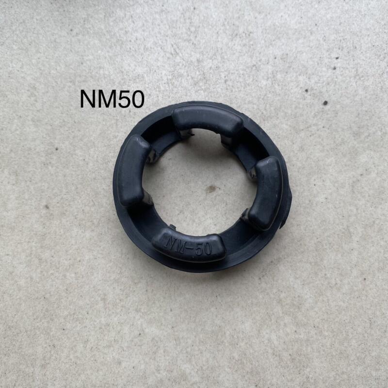 Black NM50 flexible coupling insert showing four inward-facing pads.